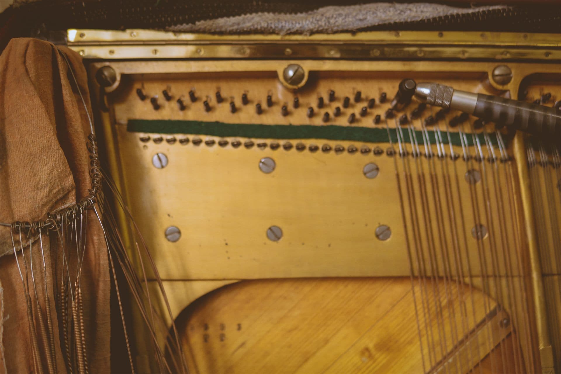 Piano soundboard and strings during restoration inspection